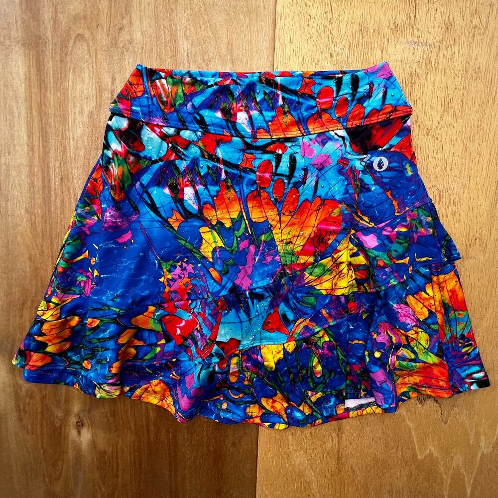 DONA JO MINI SKIRT SKORT WOMEN’S sz S Abstract Brilliant Multi Color Tennis